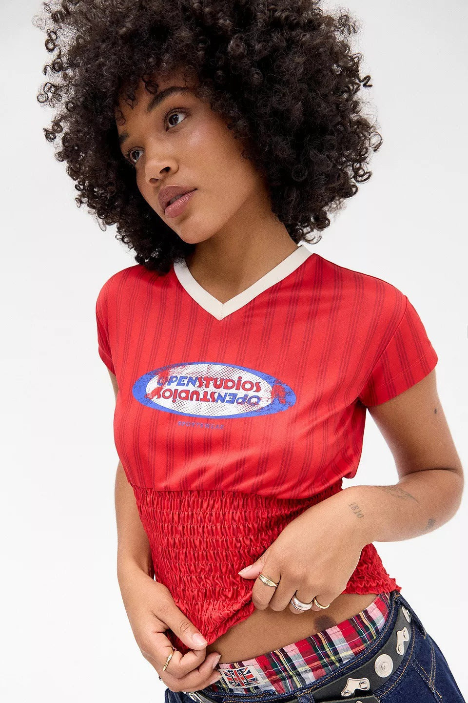 Damen Sportliches Crop-Top mit elastischem Smocking und modernen Grafikdetails WOLFF