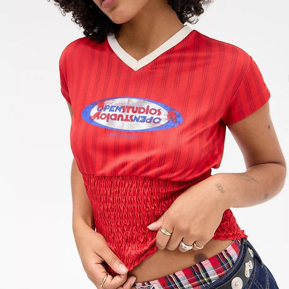 Damen Sportliches Crop-Top mit elastischem Smocking und modernen Grafikdetails WOLFF