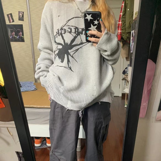 Damen Oversized Pullover mit kreativem Spinnenmotiv WOLFF